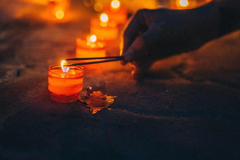 lighting tealight candles with stick