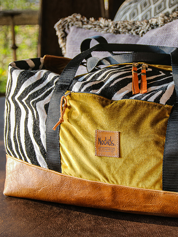 African Monarch Lodges Sijwa Boutique Nockels Bag