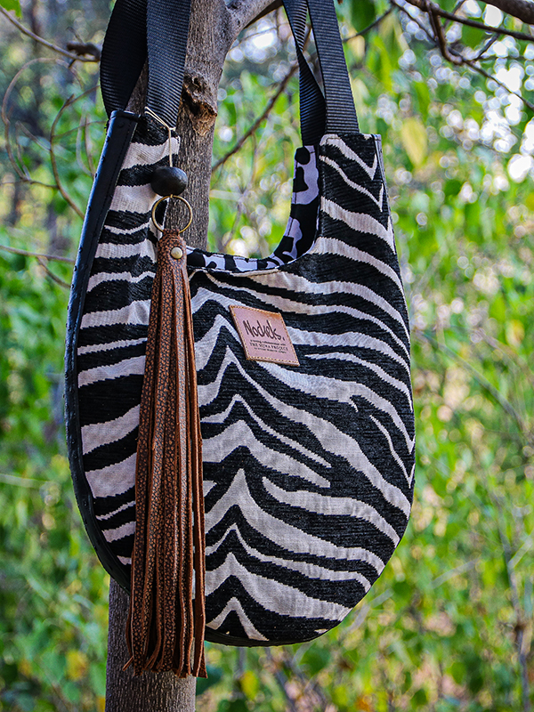 African Monarch Lodges Sijwa Boutique Nockels Bag