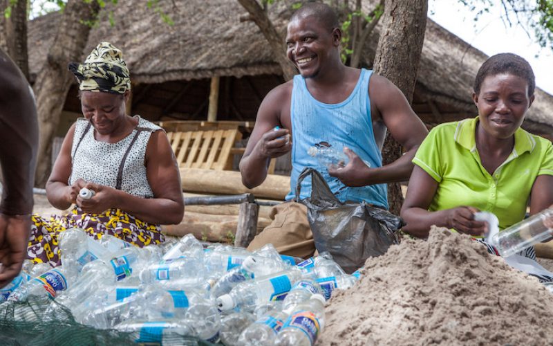 building plastic walls at Sijwa Project